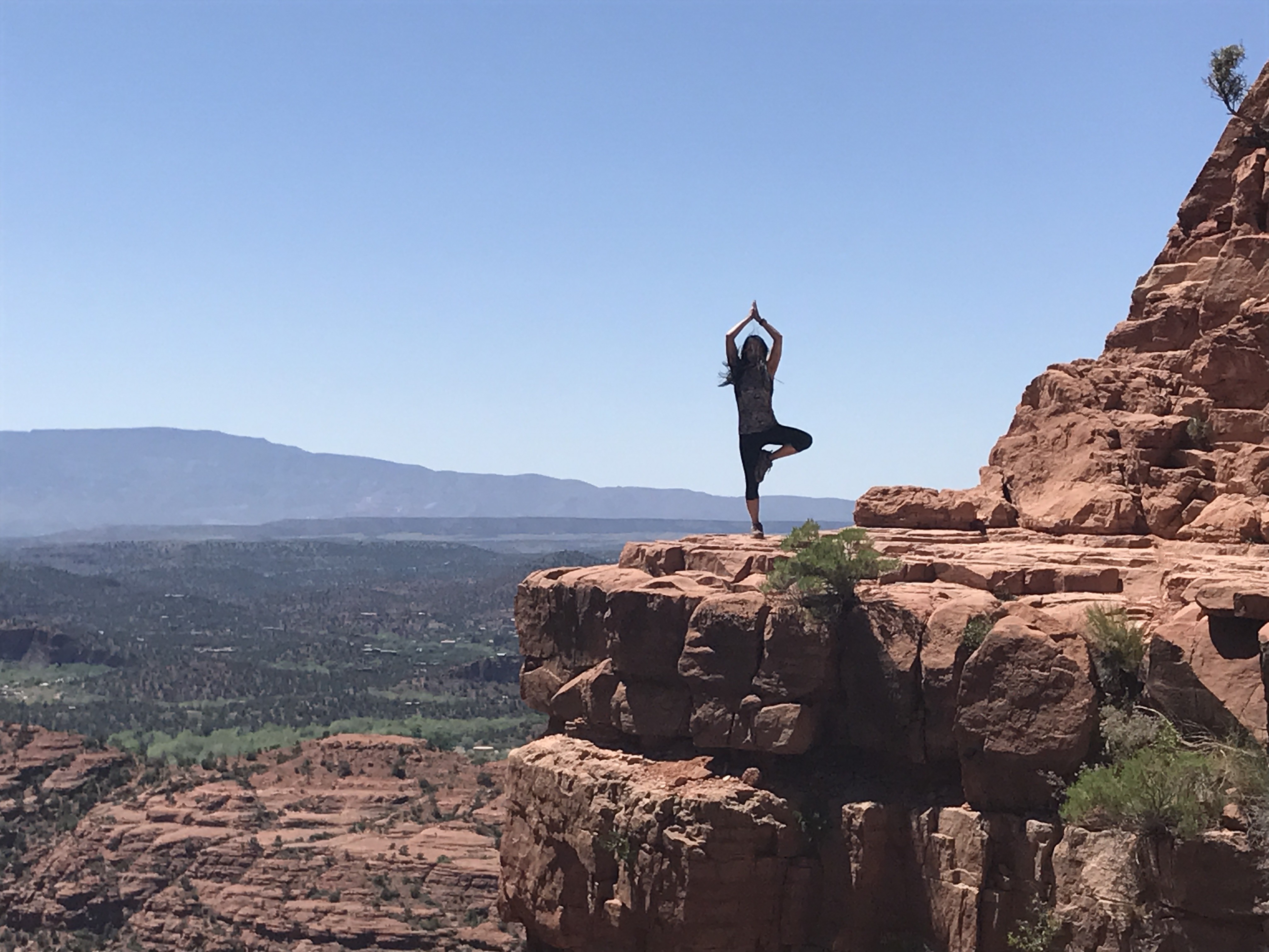 Me doing a yoga Tree Pose on a rock ledge at the top of Cathedral Rock. Sedona, AZ - 2017.04.28