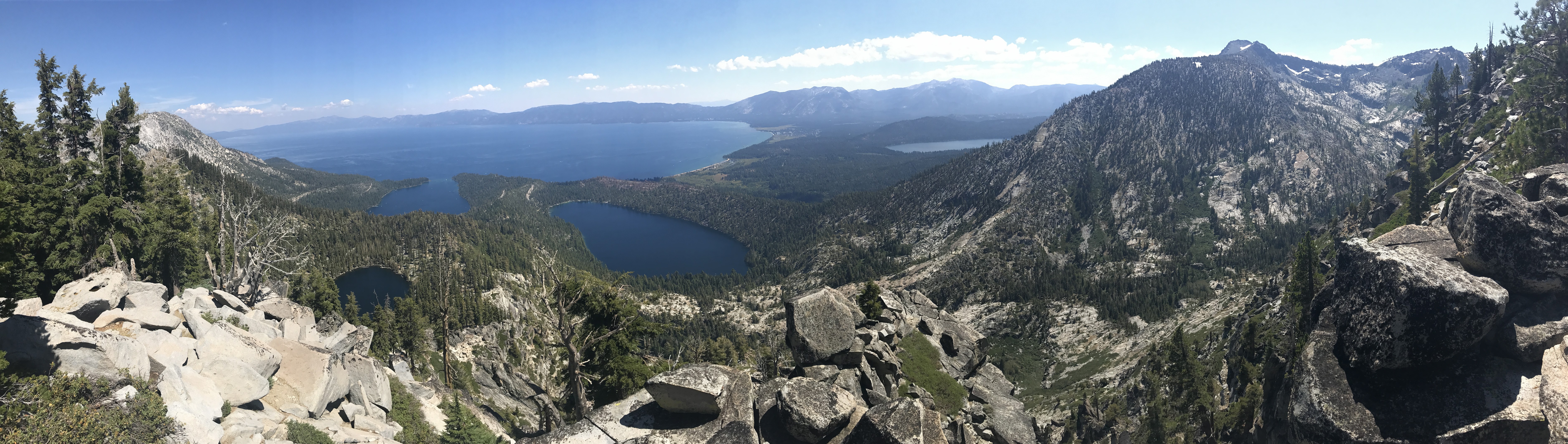 A wider panoramic view of the rocks surrounding Maggie's Peaks and the lakes down below. 8/24/2017 Lake Tahoe